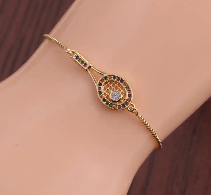 Bracelet doré raquette de tennis ajustable